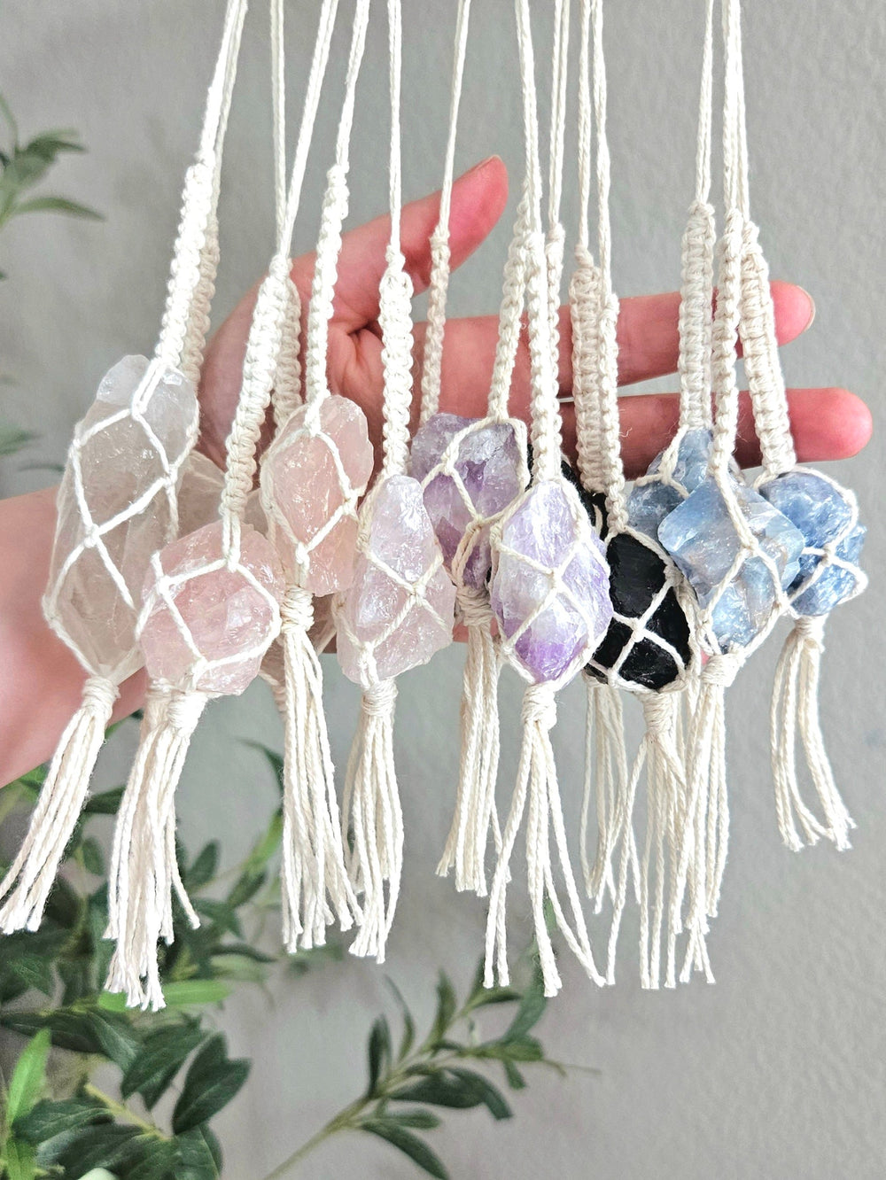 Macrame wrapped crystal rear view mirror charm.