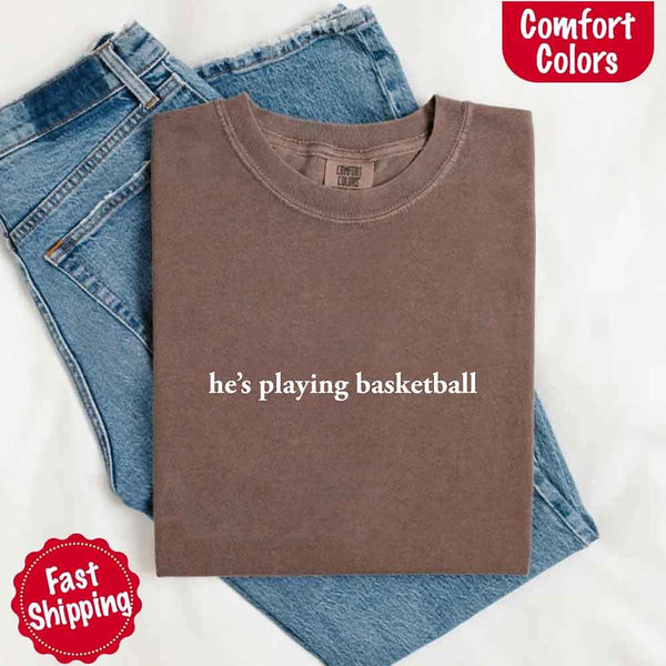 He’s Playing Basketball – Funny Sports Girlfriend Comfort Color Shirt for Women