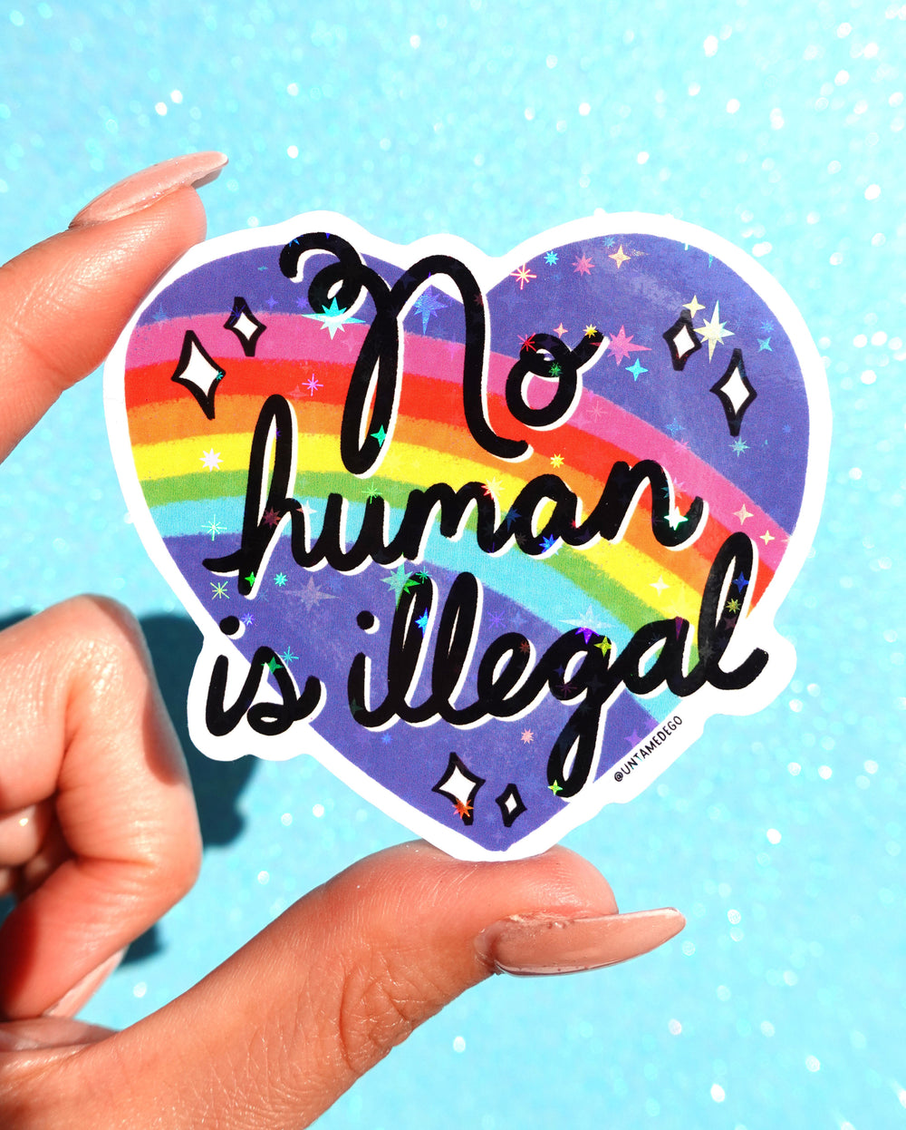 No Human Is Illegal Sticker – Rainbow Heart Holographic Vinyl Sticker